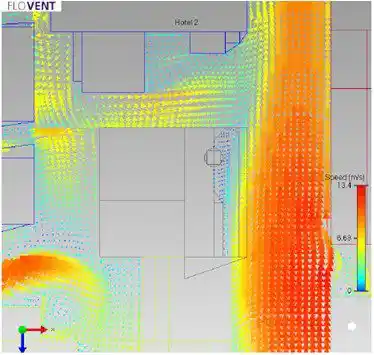 Computational Fluid Dynamics (CFD) simulation showing airflow velocity and thermal distribution around urban buildings
